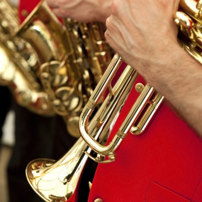 Two trumpeters playing in a marching band